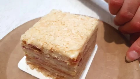 Napoleon cake. Multilayer cake, cake napoleon close-up Stock Footage 313614531