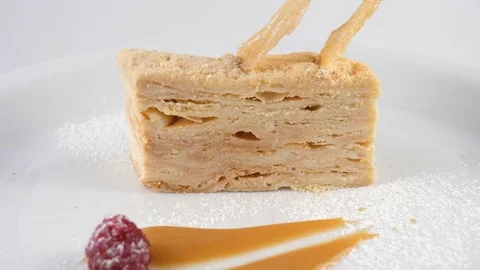 Napoleon cake or Mille-feuille, multi-layered classic dessert Stock Footage 79985812