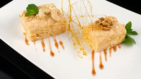 Napoleon cake or multi-layered classic dessert, served in luxury restaurant Stock Footage 90718448