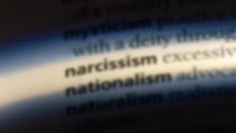 Narcissism word in a dictionary. Stock Footage 99562275