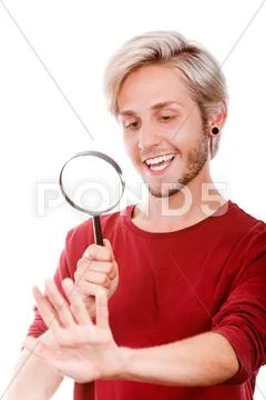 Narcissistic handsome young man Stock Photos