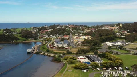 Narooma regional town waterfront on Wagonga inlet shellfish oyster farms 4k Stock Footage 194480897