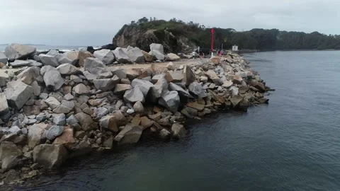 NAROOMA SEA WALL ROCKS 動画素材 163223304