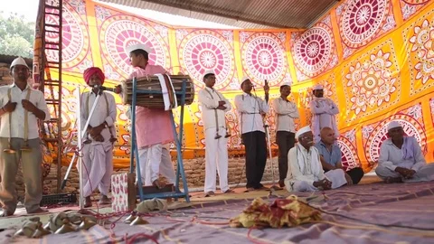 A narration given by man with music called KIRTAN Stock Footage 77192641