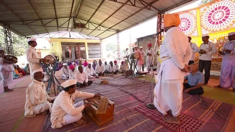 A narration given by man with music called KIRTAN Stock Footage 77192847