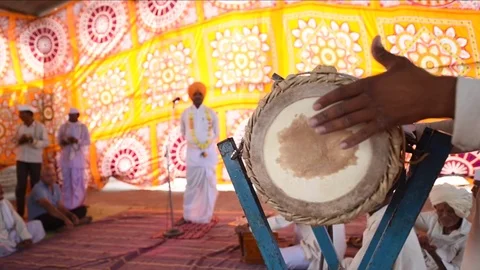 A narration given by man with music called KIRTAN Stock Footage 77192964