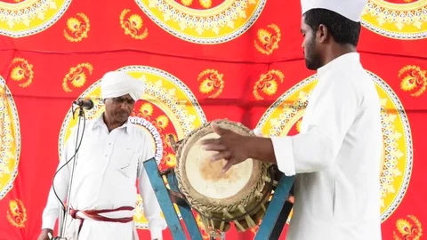 A narration given by man with music called KIRTAN Stock Footage 77396852