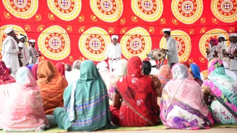 A narration given by man with music called KIRTAN Stock Footage 77397086