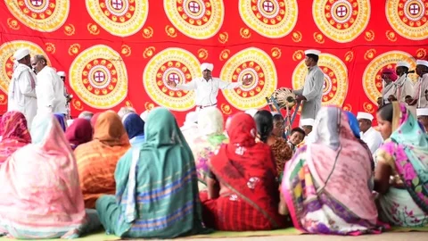 A narration given by man with music called KIRTAN Stock Footage 77397110