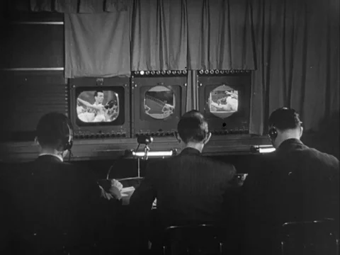 Narrator explains the television programme broadcasting procedure - 1949 Vídeos de archivo 93690353