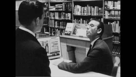 Narrator talk about the information can be saved in various device - 1966 Stock Footage 99098666