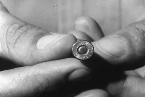 Narrator talks about the fire strike detail of revolver - 1960 Stock Footage 106068136