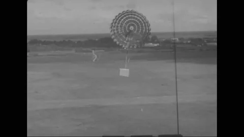Narrator talks about parachute low altitude delivery system - 1964 Vidéo 99115009