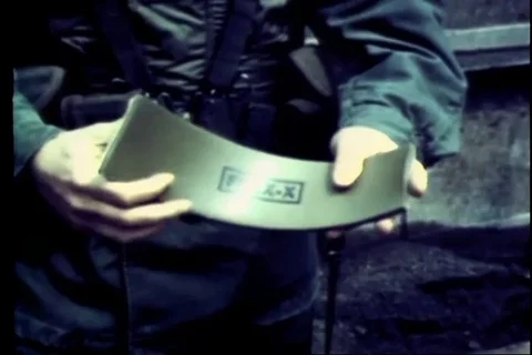 Narrator talks about a plastic demolition charge in detail - 1966 Stock Footage 94255253