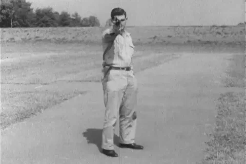 Narrator talks about the right position accurate to shoot - 1960 Stock Footage 106067931