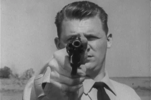 Narrator talks about the right position to handle revolver - 1960 Stock Footage 106067974