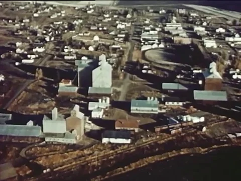 Narrator talks about town and airport construction - 1954 Stock Footage 95604650