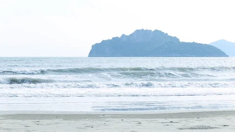 Narrow beach line,Sea waves with wave crashing on sandy shore Stock Footage 112107951