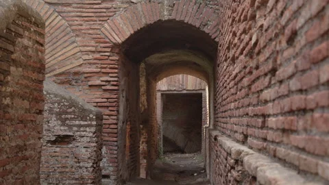Narrow Brick Passage and Vaulted Archway at Ancient Roman Buildings Stock Footage 345736626