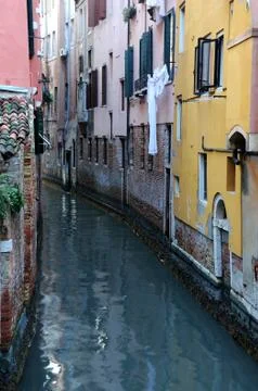 Narrow canal in venice Stock Photos