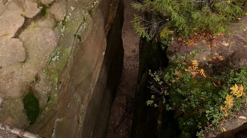 Narrow corridor in the rocks. View from above Stock Footage 80938656