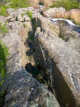 Narrow deep gorge Stock Photos
