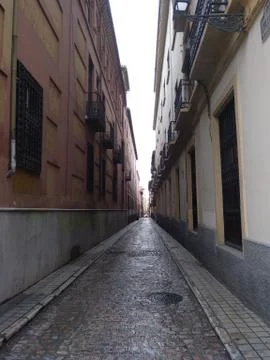 Narrow empty street Stock Photos