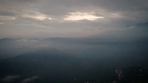 Narrow Fissure in Massive Cloud Layer Releasing Pallid Beams Video stock 316798708