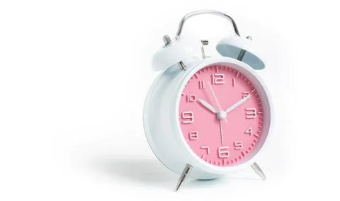 Narrow focus to clock with time 10 past 12 or 10.00 AM PM, pink clock face, o Stock Photos