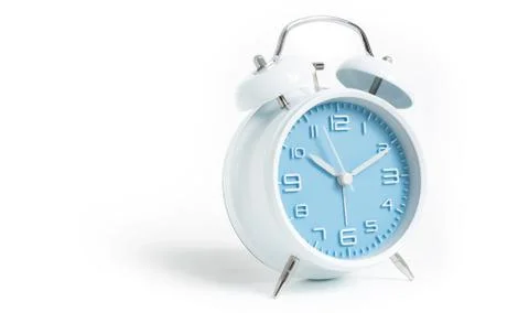 Narrow focus to clock with time 10 past 12 or 10.00 AM PM, blue clock face, o Stock Photos