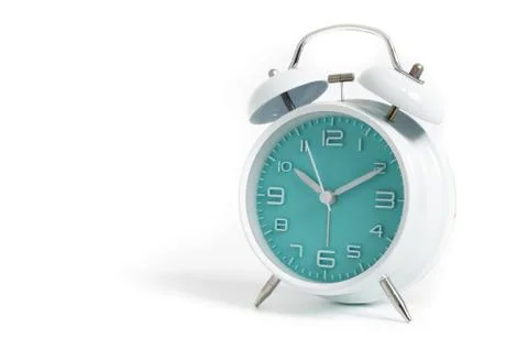 Narrow focus to clock with time 10 past 12 or 10.00 AM PM, turquoise clock fa Stock Photos