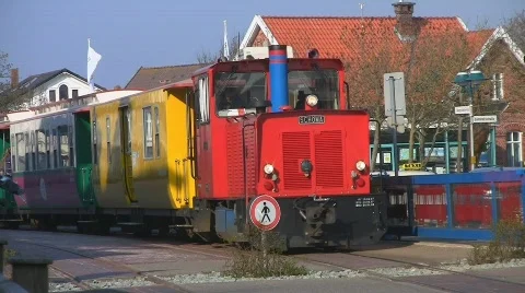 Narrow gauge train passing by Stock Footage 708226