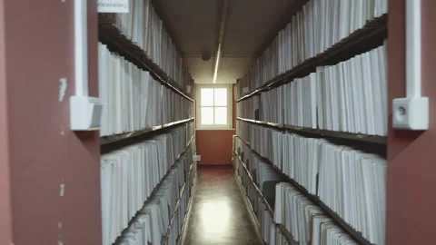 Narrow hallways in records storage facility. Vídeos de archivo 303666283