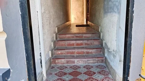 Narrow Interior Stairway with Patterned Tile Floor and Brick Steps Vídeos de archivo 346441302