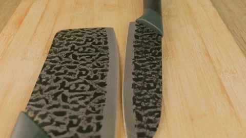 Narrow kitchen chef knife compared with wide kitchen chef knife Stock Footage 340324115