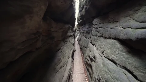 Narrow passage between rocks at Bledne Skaly, Poland Stock Footage 97199661