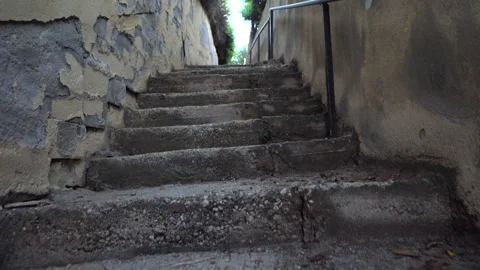 The narrow passage between the two walls to the sea 動画素材 321184569