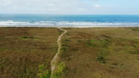 Narrow path leads to beautiful blue sea and secluded Pontal do Parana Video stock 135137031