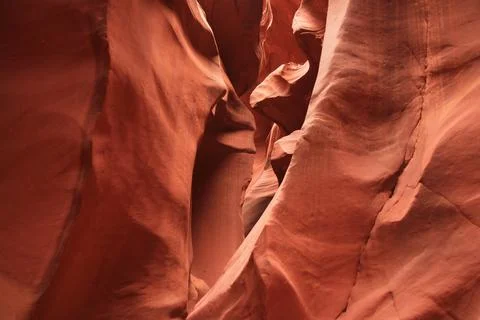 The narrow path surrounded by red walls in the Antelope Canyon Stock Photos