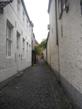 Narrow path through the streets of Brussels. Stock Photos
