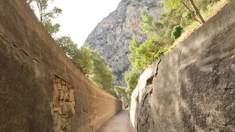 Narrow pathway between concrete walls Caminito del Rey Video stock 220741395