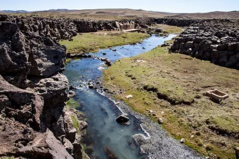 A narrow river in the steppe Stock Photos