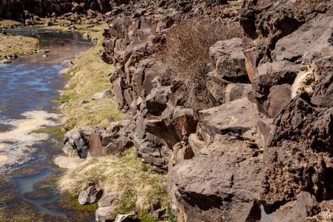 A narrow river in the steppe Stock Photos