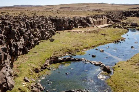 A narrow river in the steppe Fotos de archivo
