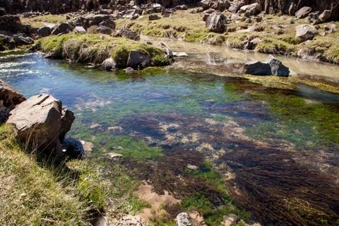 A narrow river in the steppe Stock Photos