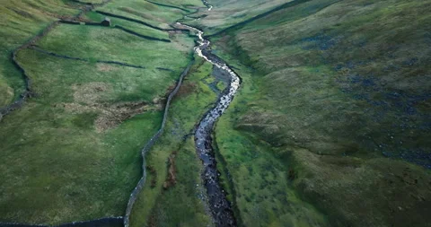 Narrow river in a valley Stock Footage 307465681