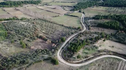 Narrow road on bare land, su01 Stock Footage 106491093