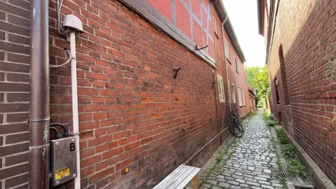Narrow Service Passage Along Old Brick Building Stock Footage 341968185