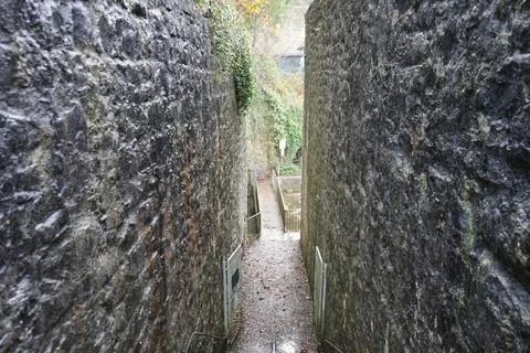 Narrow Stone Passage And Path In A Dyserth Gorge, North Wales. Stock Photos