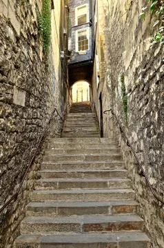 Narrow stone steps Stock Photos